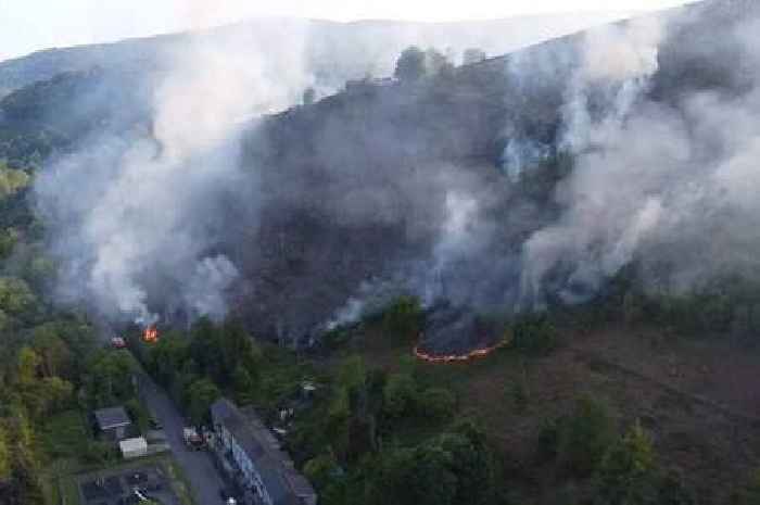 Crews spend hours tackling large grass fire above Welsh village
