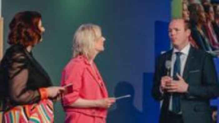 Minister apologises for comment at women's sport event