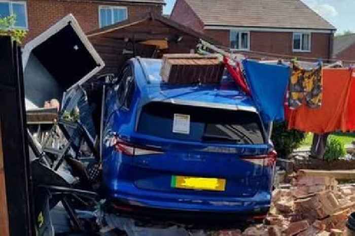 Electric car smashes into garden and through brick wall in chaotic South West scenes