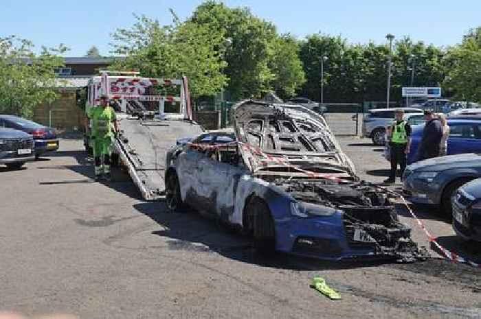 Burnt out Audi at centre of Daniel attack at garage in pictures as cops hunt men