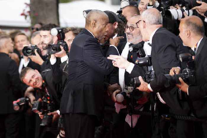 WATCH: Denzel Washington Yells at Photographer After Being Grabbed on Cannes Red Carpet: ‘Stop!’