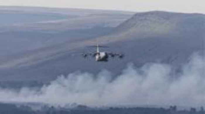 Wildfire blazes in woods for eight hours