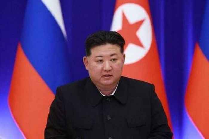 North Korea's new warship sinks at launch in front of Kim Jong-un