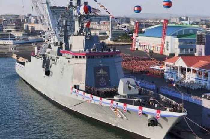 North Korea's huge new warship sinks during launch in front of Kim Jong-un