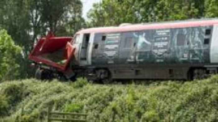 Two in hospital, one arrested after train crash