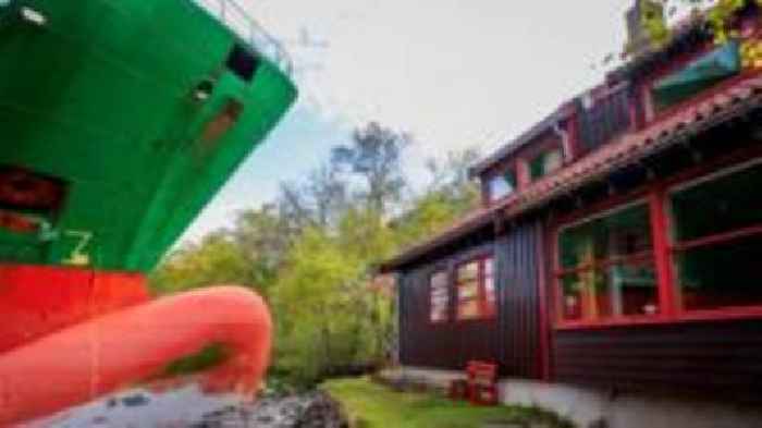 Man steering ship that crashed into garden fell asleep, police say