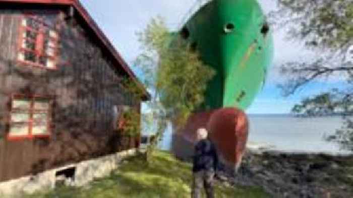 Watch: 'I didn't hear anything' - man who woke to find cargo ship in garden