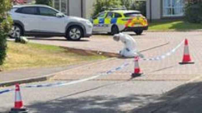 Man slashed by masked gang outside home as feud escalates
