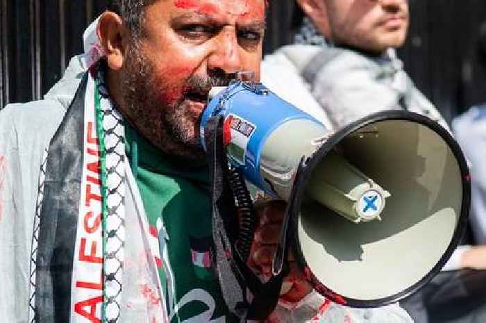 Pro-Palestine protester padlocks himself to Cambridge University fence on graduation day