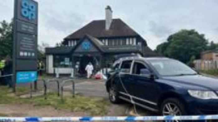 Thieves smash shopfront with car and steal ATM
