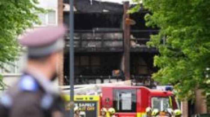 Murder arrest as mum and three children die in fire
