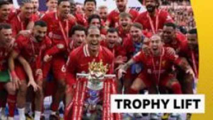 Van Dijk lifts Premier League trophy at rapturous Anfield
