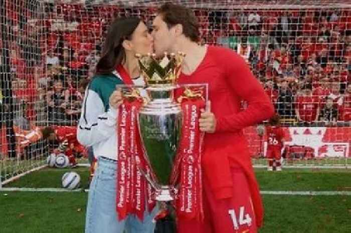 Liverpool WAG dubbed 'prettiest girl ever' steals show at Anfield in retro footie shirt