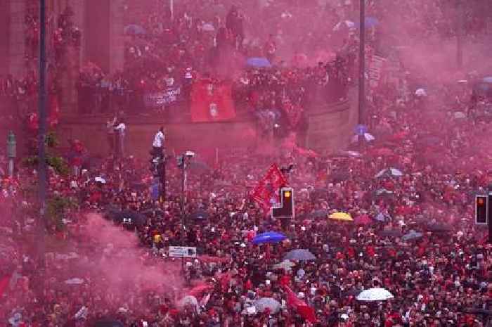 Star's awkward moment on open top bus during Liverpool title celebrations