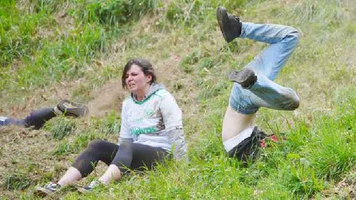'I risked my life for this': Cheese-loving daredevils hurl themselves down steep hill in famous race