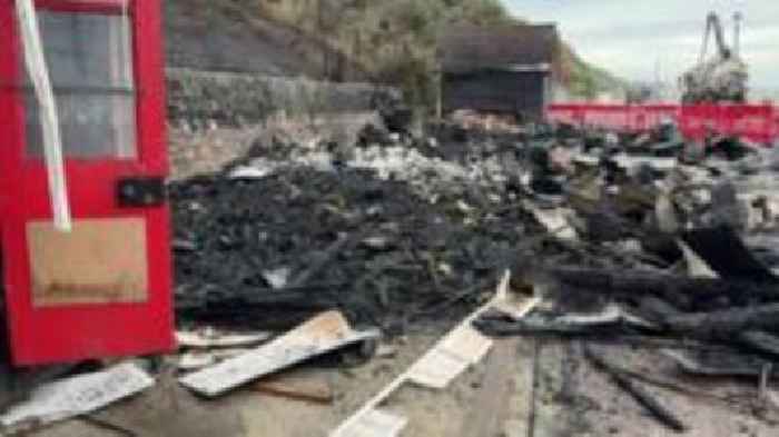 Beach huts razed by fire