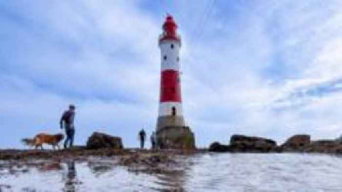 Walkers raise £8,000 hiking around lighthouse