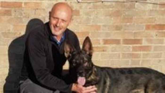 Dog handler recognised for 50 years of service