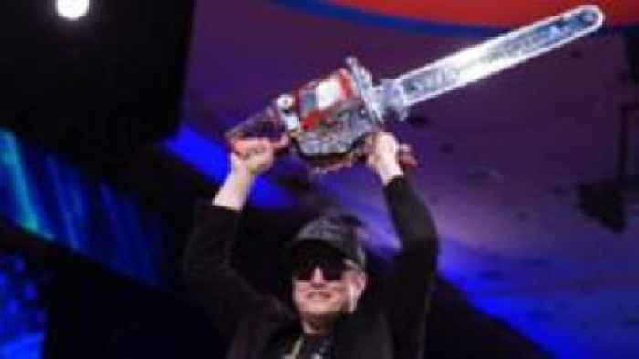 A chainsaw, two hats and Lil X: Musk's eventful time at Doge