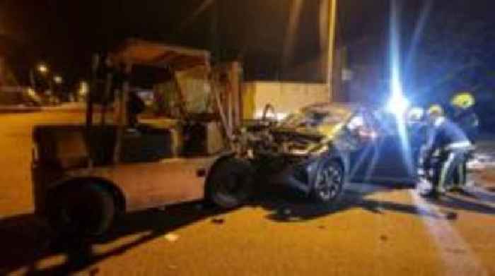 Man arrested after forklift hits multiple vehicles
