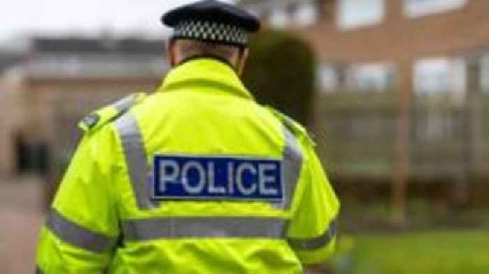 Arrest after policeman injured by car in Manchester