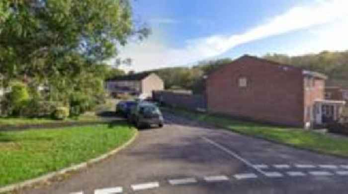 Two arrested after man dies in garden