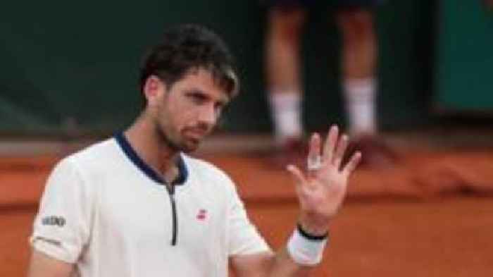 Norrie beats Fearnley after firework disruption