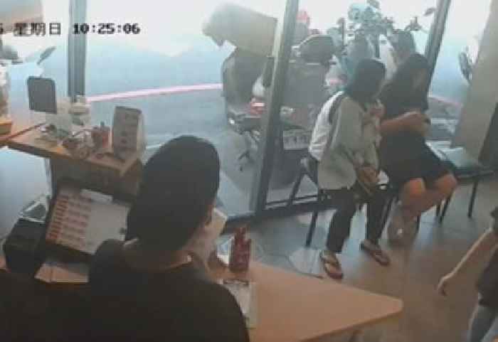 Car Smashes Directly Into a Restaurant While People Are Eating