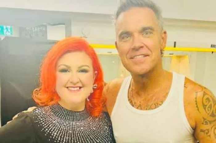 Michelle McManus joins Robbie Williams on stage at Murrayfield Stadium for incredible duet