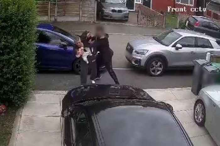 Horrific moment dad was randomly attacked in the street while carrying his daughter