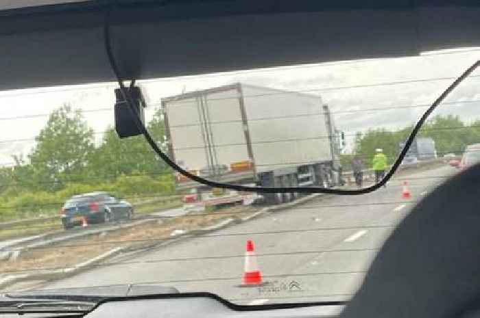 Peterborough lorry crash live: Long delays after lorry crash sees damage to road