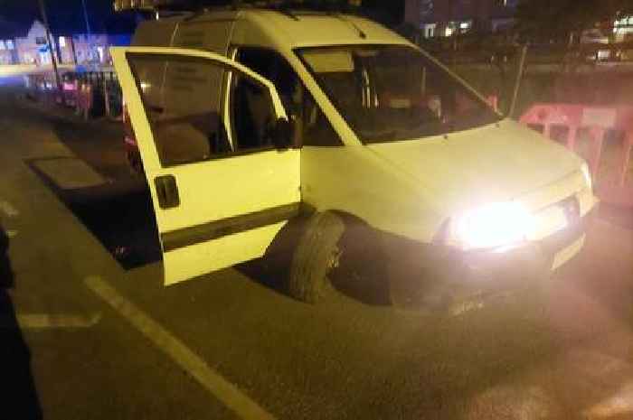 Van full of empty beer cans found crashed into bollard as police hunt driver