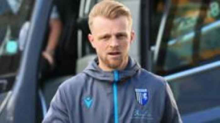 Gillingham left-back Clark signs new one-year deal