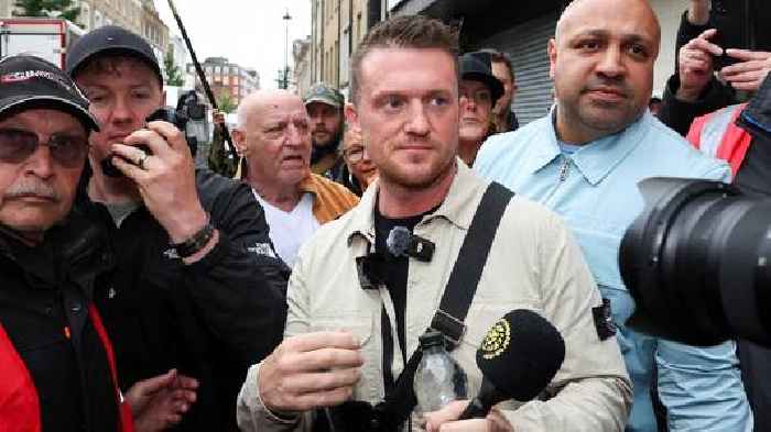 Tommy Robinson denies harassing two journalists