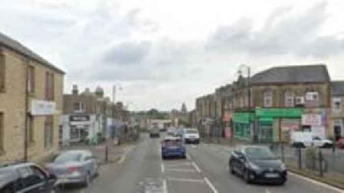 Man pinned to wall by car in 'targeted assault'