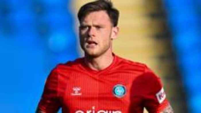 Huddersfield sign Wycombe defender Low
