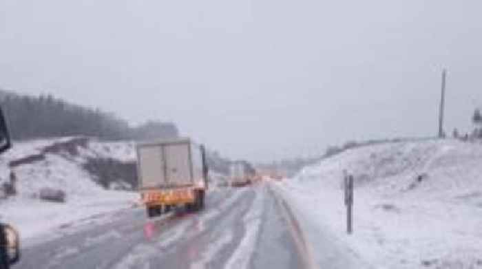 Schoolchildren swept away as heavy floods and snow hit South Africa