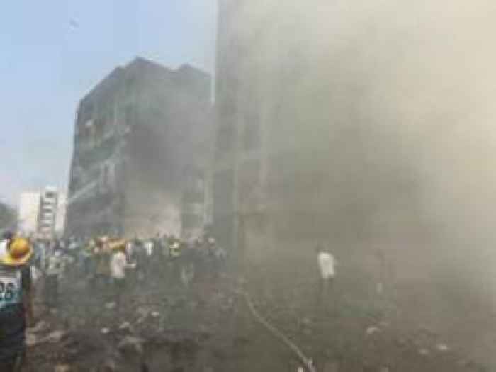 Watch: BBC correspondent at crash scene as rescuers work among wreckage