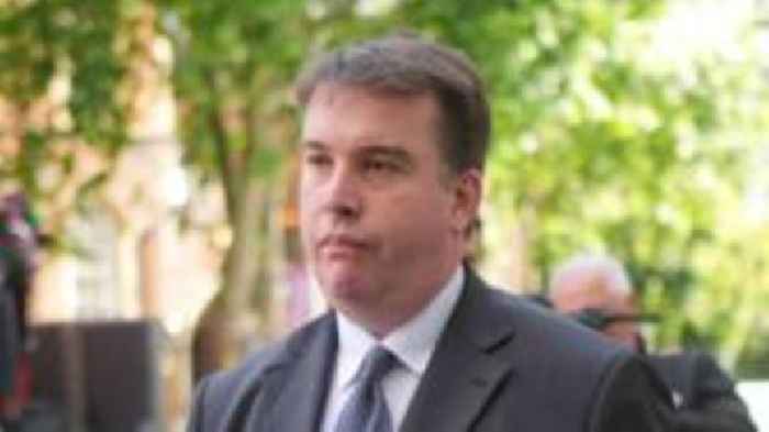 Ex-Tory MP among 15 in court to face betting charges
