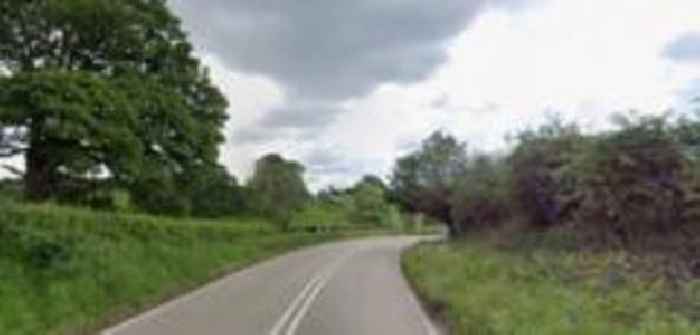 Woman dies and man injured in car and van crash