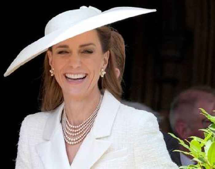 Kate Middleton laughs and says 'again and again' at return to event