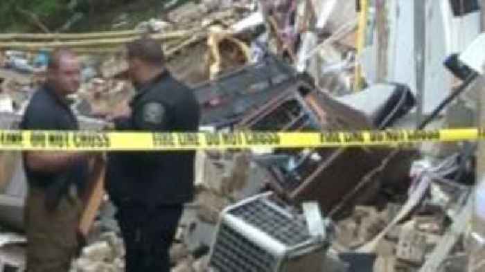 At least six people are dead after flash floods hit West Virginia