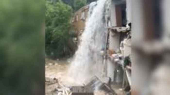 Watch: Houses and roads destroyed by deadly flash flooding in West Virginia