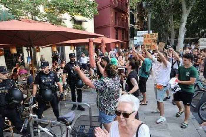 Protests in Spain see 30,000 storm city's streets to tell holidaymakers 'go home'