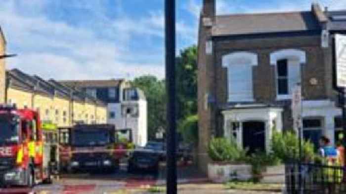 Murder arrest as woman found stabbed in house after 'gas explosion'