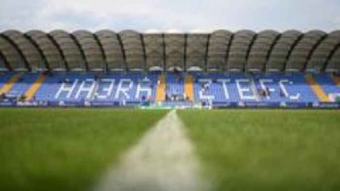 Why will Scotland be playing Belarus in an empty Hungarian stadium?