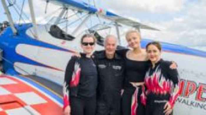 Cousins complete history-making wing walk