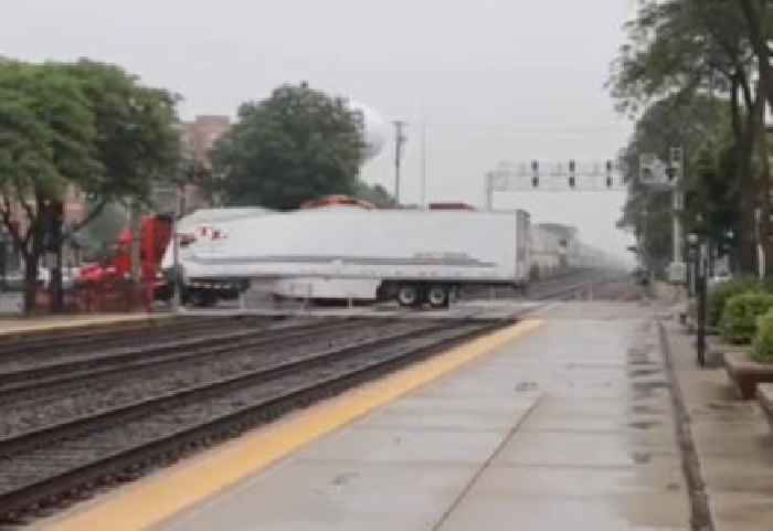Truck Gets Destroyed by Freight Train