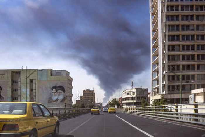 Is Israel trying to destroy Iran’s nukes — or topple its government?