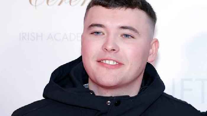 Kneecap rapper appears in court on terror charge - as protesters gather outside